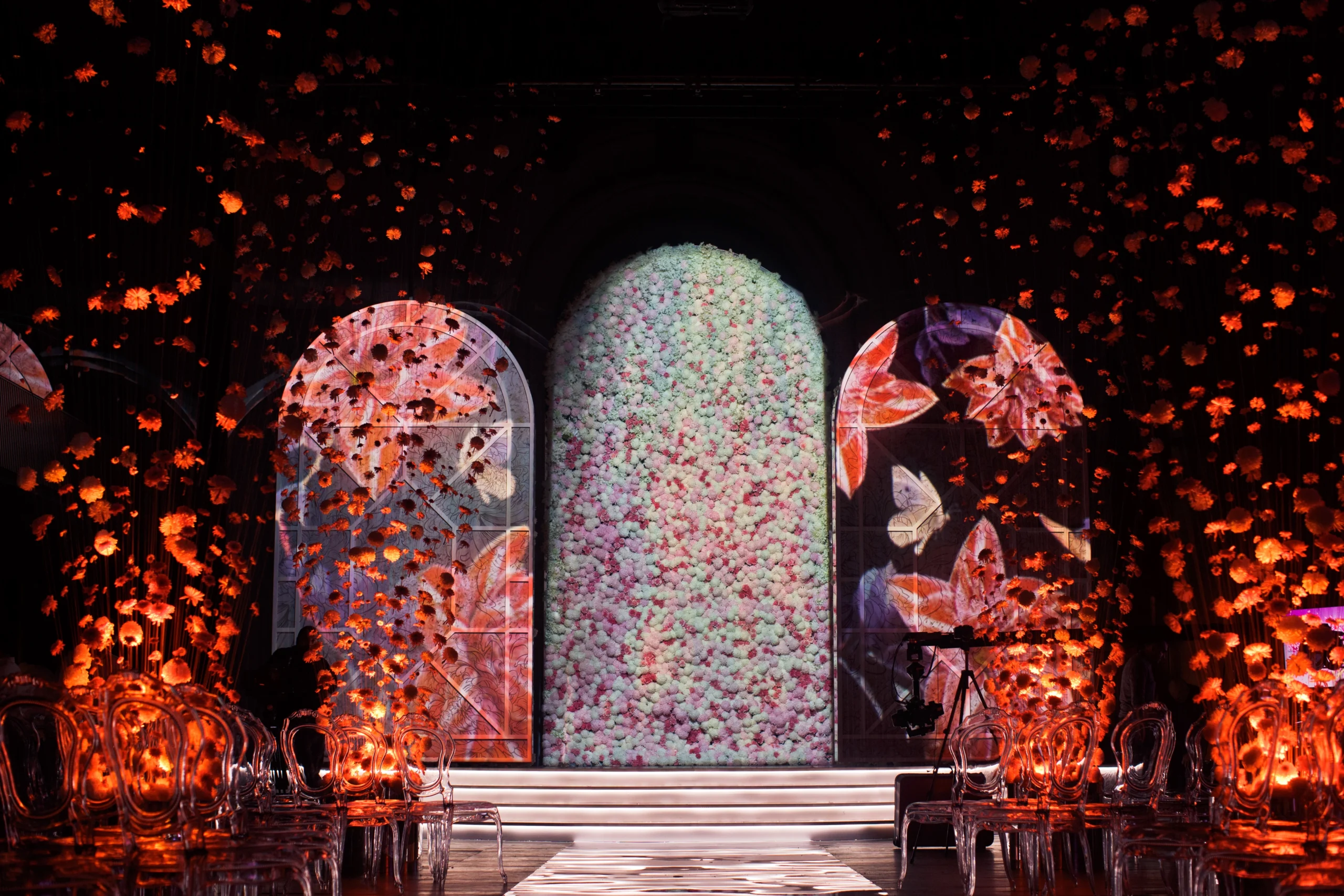 glance-path-leads-bright-archs-with-flowers-dark-room